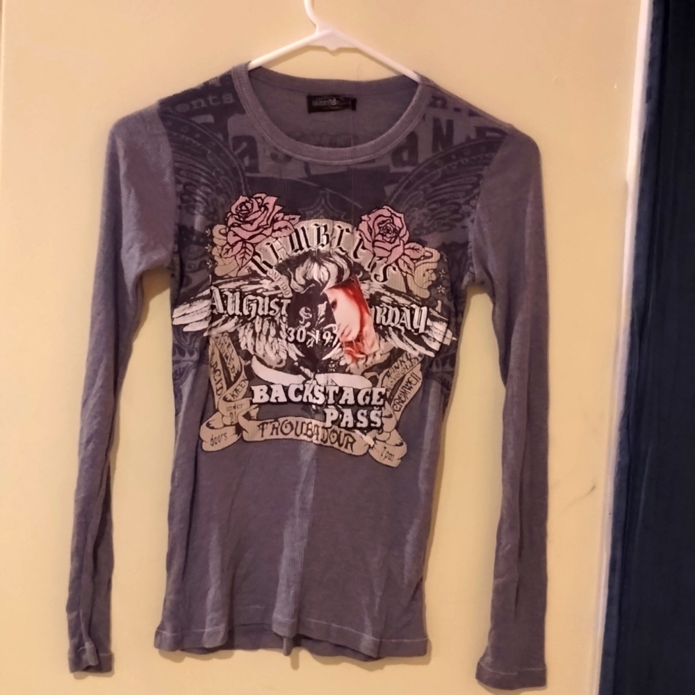 A grey, Skinny Minnie, long sleeve shirt.